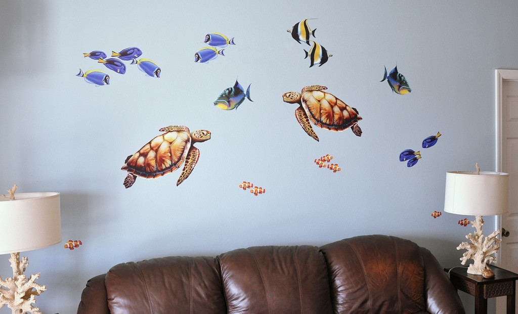 Sea Turtles and reef fish improving the rooms decor.